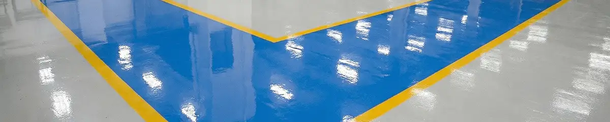 A factory floor professionally covered and marked with epoxy flooring in Clearwater, FL