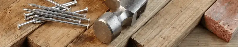 Hammer and nails on hardwood flooring boards in Clearwater, FL