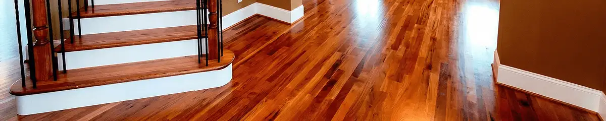Base floor of a staircase with professionally restored wood flooring in Clearwater FL