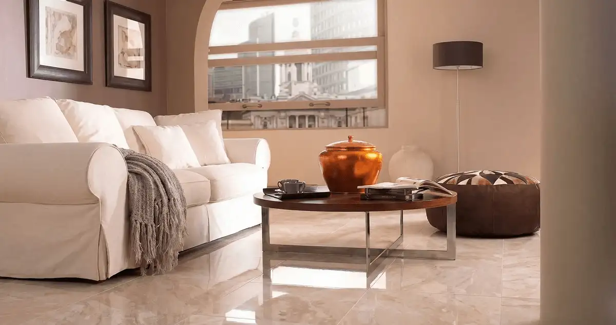 Modern living room with professionally installed marble flooring, a beige sofa, coffee table in Clearwater, FL