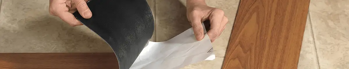 A professional installing vinyl flooring in Clearwater, FL