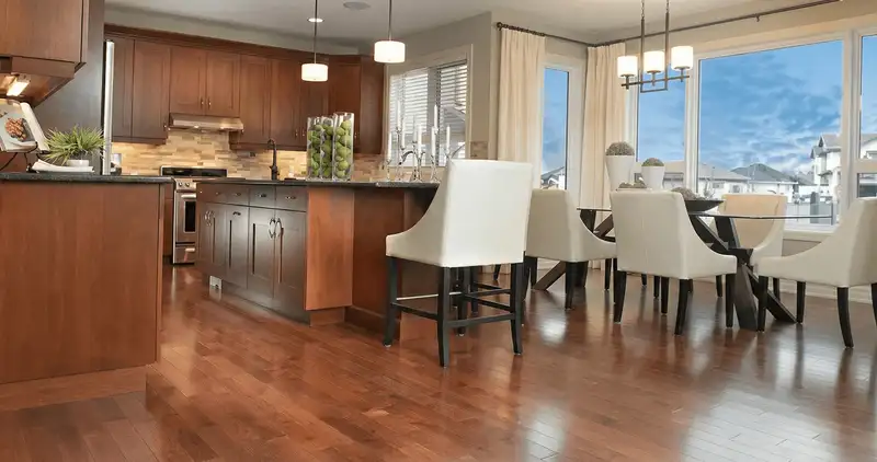 A modern kitchen with professionally installed wood flooring in Clearwater, FL